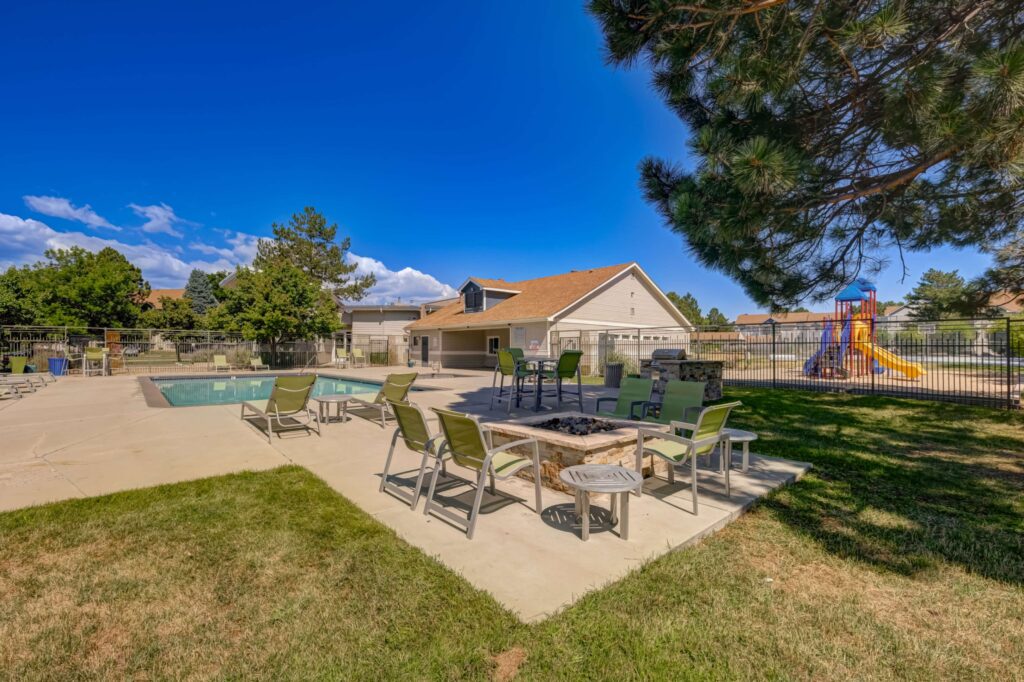 Fire pit area in front of swimming pool